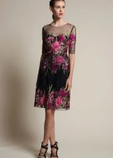 Robe de couleur avec une manche trois-quarts