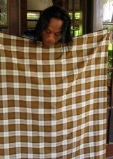 Sarong en Birmanie - une méthode pour attacher une toile cousue