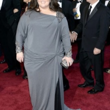 Robe longue grise avec drapé au niveau des hanches et manches longues