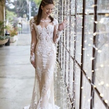Robe de mariée à manches transparentes