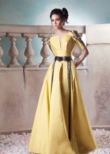 Robe de soirée jaune avec empiècements en cuir noir
