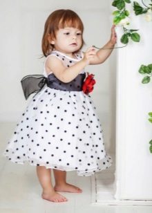 Robe élégante pour fille blanche à pois noirs