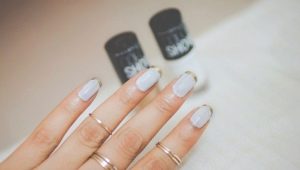 Veste dorée sur les ongles: pertinence et idées originales
