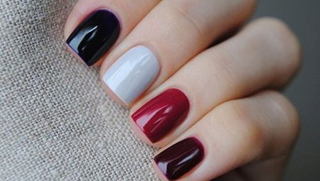 Ongle multicolore d'une main: chaque ongle est individuel
