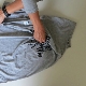 Comment rapidement plier un t-shirt