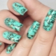 Manucure aux couleurs noir et turquoise: beauté et style