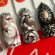 Monogrammes sur les ongles: types de motifs et technologie pas à pas de leur application