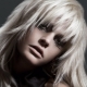 Coupes de cheveux déchirées pour cheveux moyens: caractéristiques, variétés, sélection, style