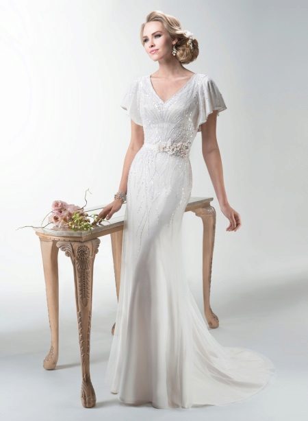 Choisir une longue robe de mariée à manches