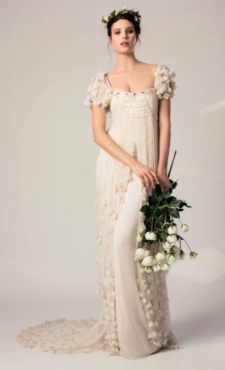 Robe de mariée de style Empire avec une lampe de poche à manches